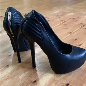 Sexy black zippered high heels size 7.5